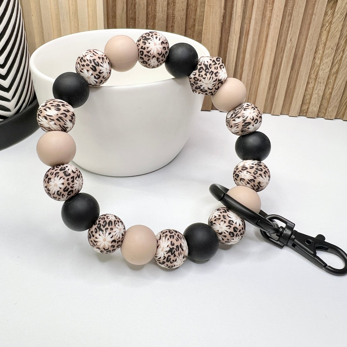 Matte Black Leopard Daisy Wristlet